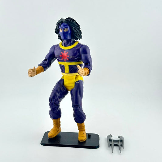 Action figure in a blue and yellow costume with a red emblem on a white background