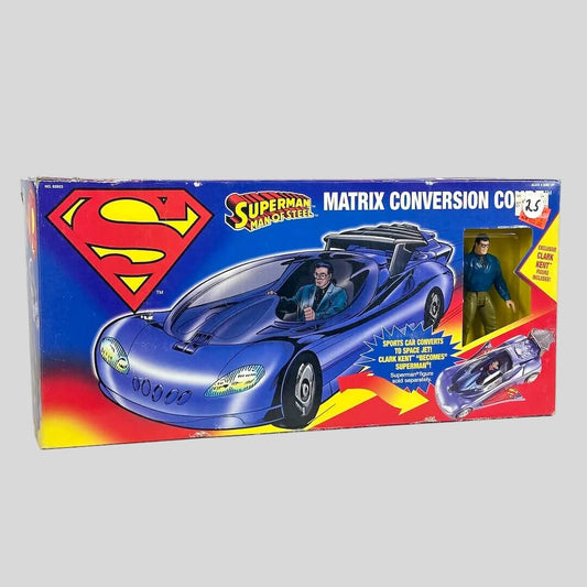 Superman toy car conversion kit packaging on a gray background