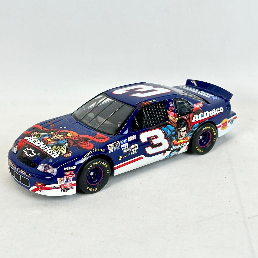 Model race car with colorful design on a white background