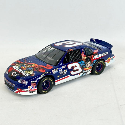Model race car with colorful design on a white background