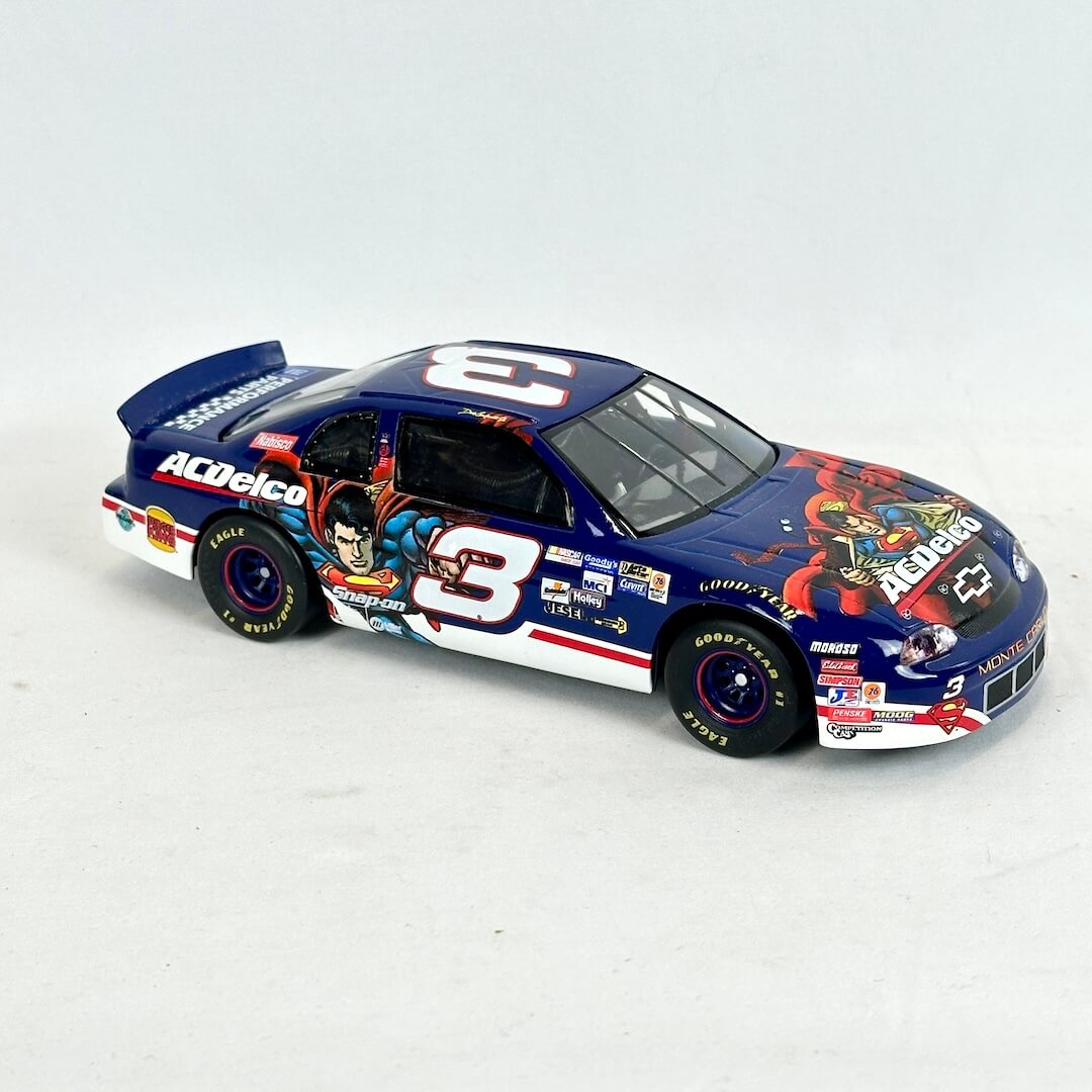 Model race car with colorful design on a white background