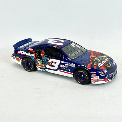 Model race car with colorful design on a white background