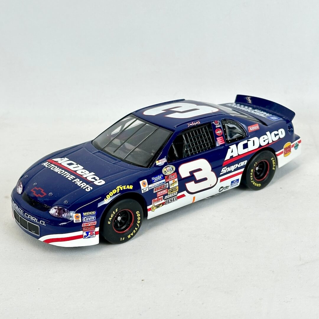 Model race car with ACDelco and other sponsor logos on a white background