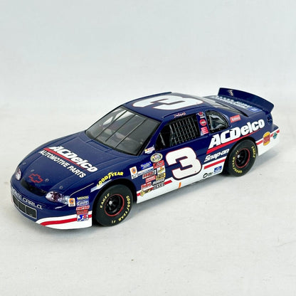 Model race car with ACDelco and other sponsor logos on a white background