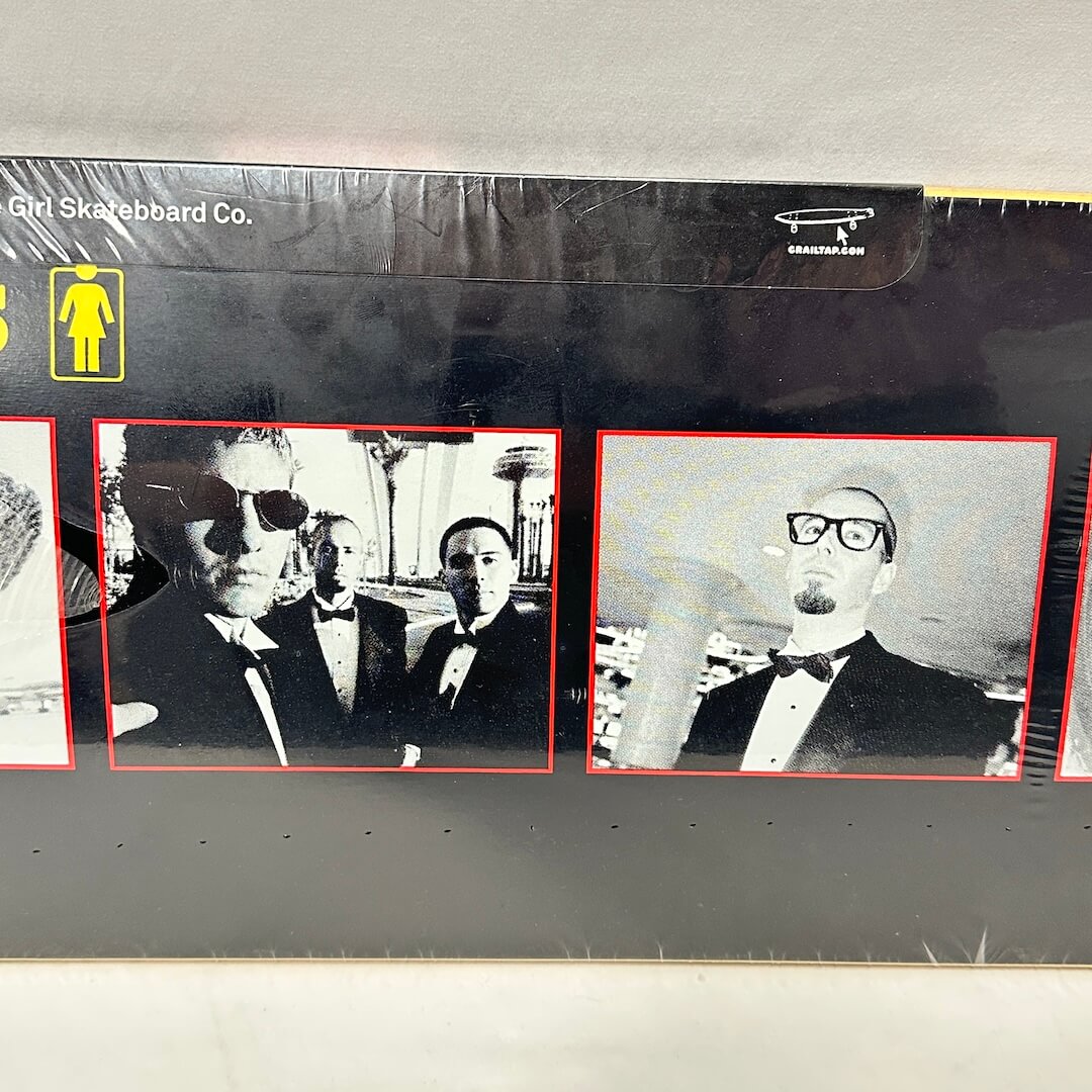 Center of deck showing close-up images from Sure Shot video and condition of plastic wrap. 