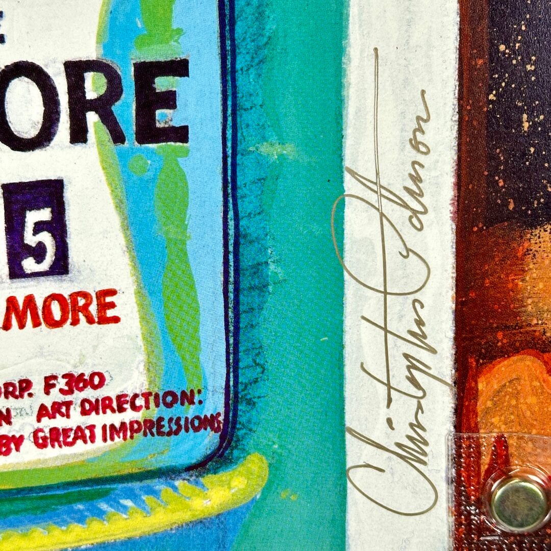 Close up of artist signature in gold along bottom right corner. 