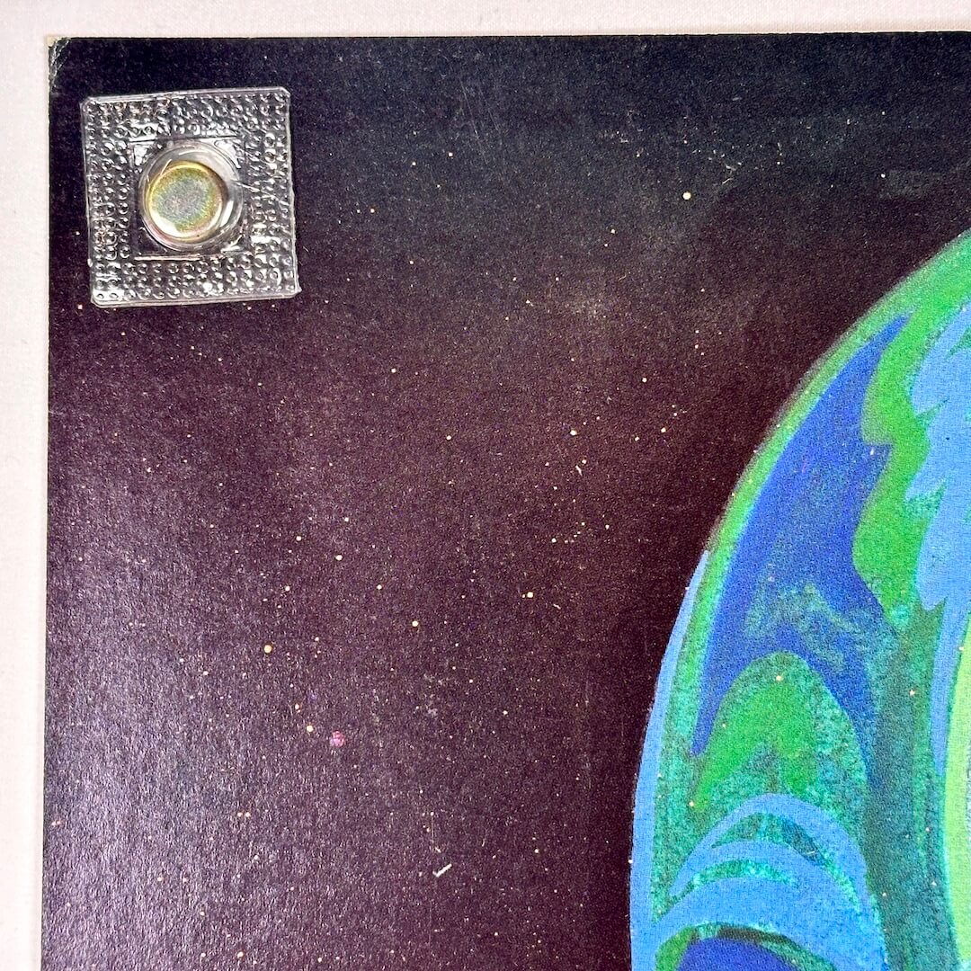 Top left corner of poster with minor corner wear but perfect edges. 