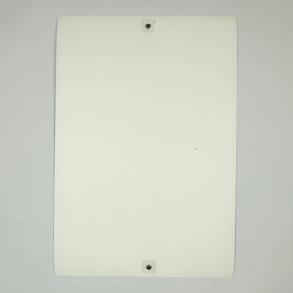 Backside of white poster against white background. 