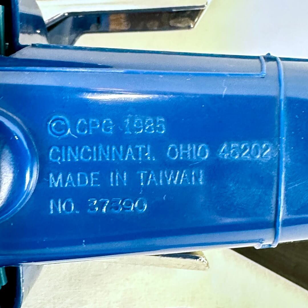 Close-up of embossed copyright and manufacturer information. 