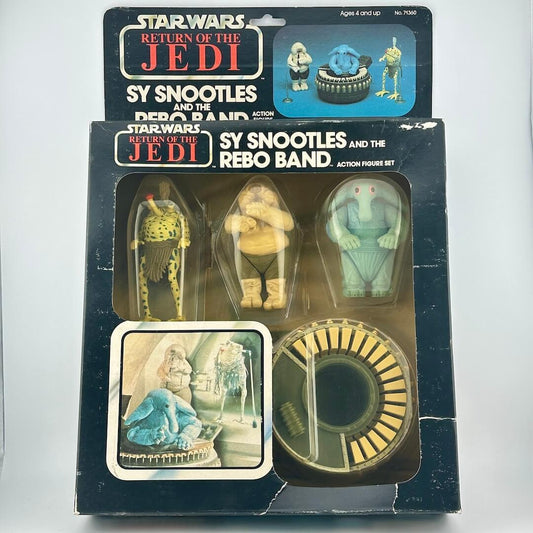 Vintage 'Star Wars' toy packaging featuring Sy Snootles and the Rebo Band on a white background.