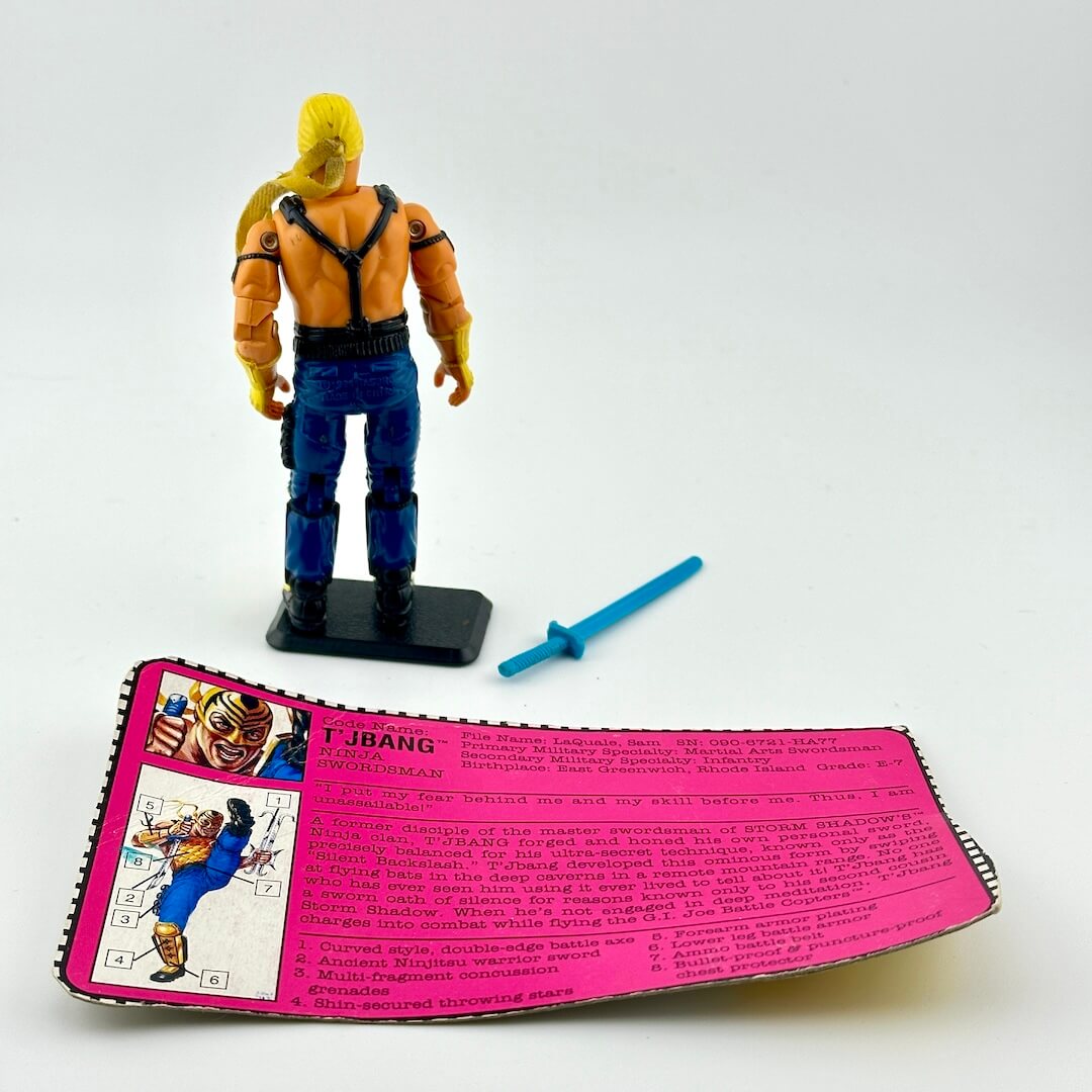 Action figure with a pink character card on a white background