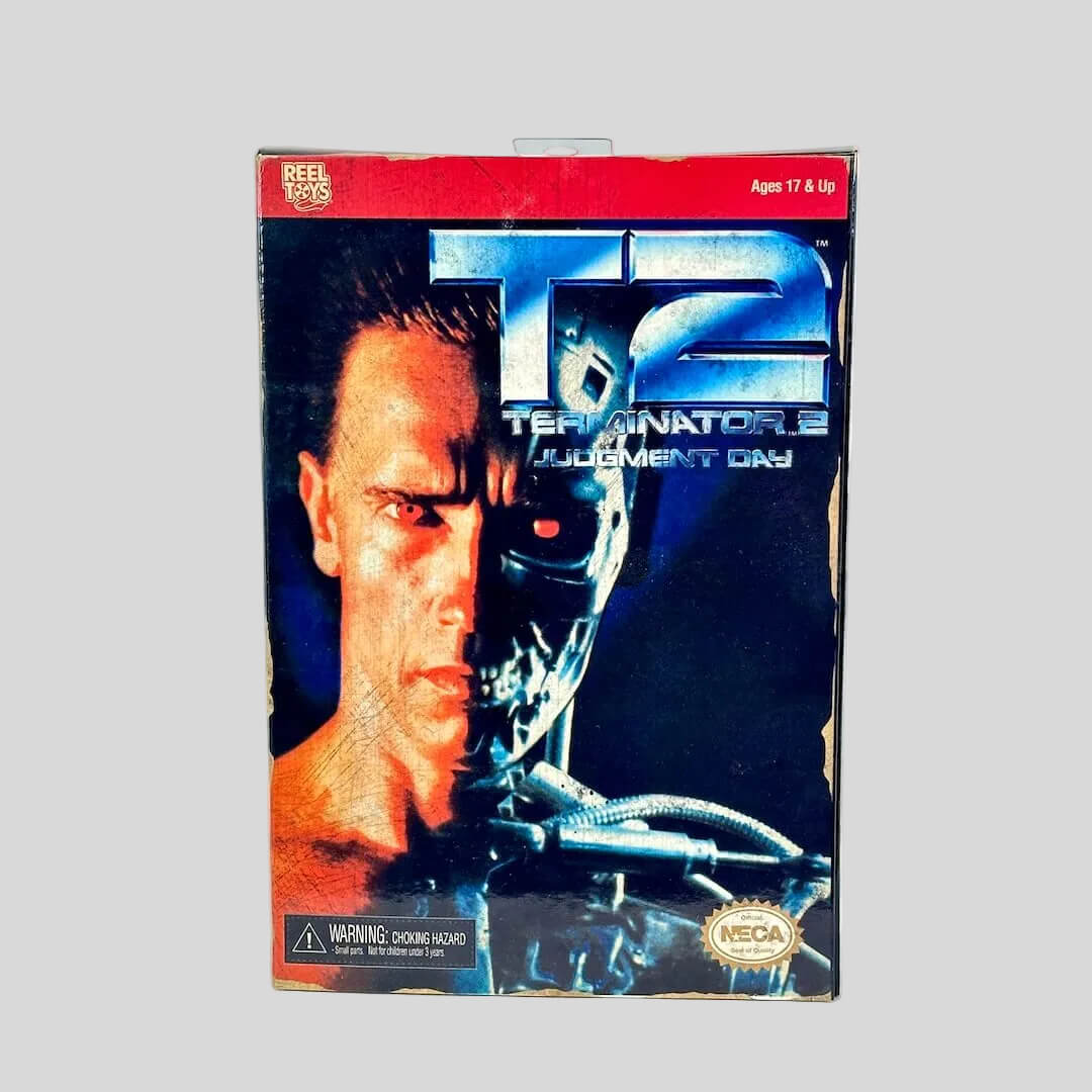 Vintage 'Terminator 2: Judgment Day' toy box with movie poster design on a white background