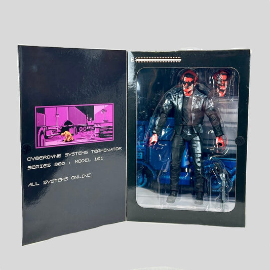 Action figure in a display case with a futuristic design on a white background