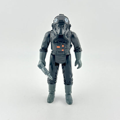 Toy figure in a detailed black suit with helmet on a white background