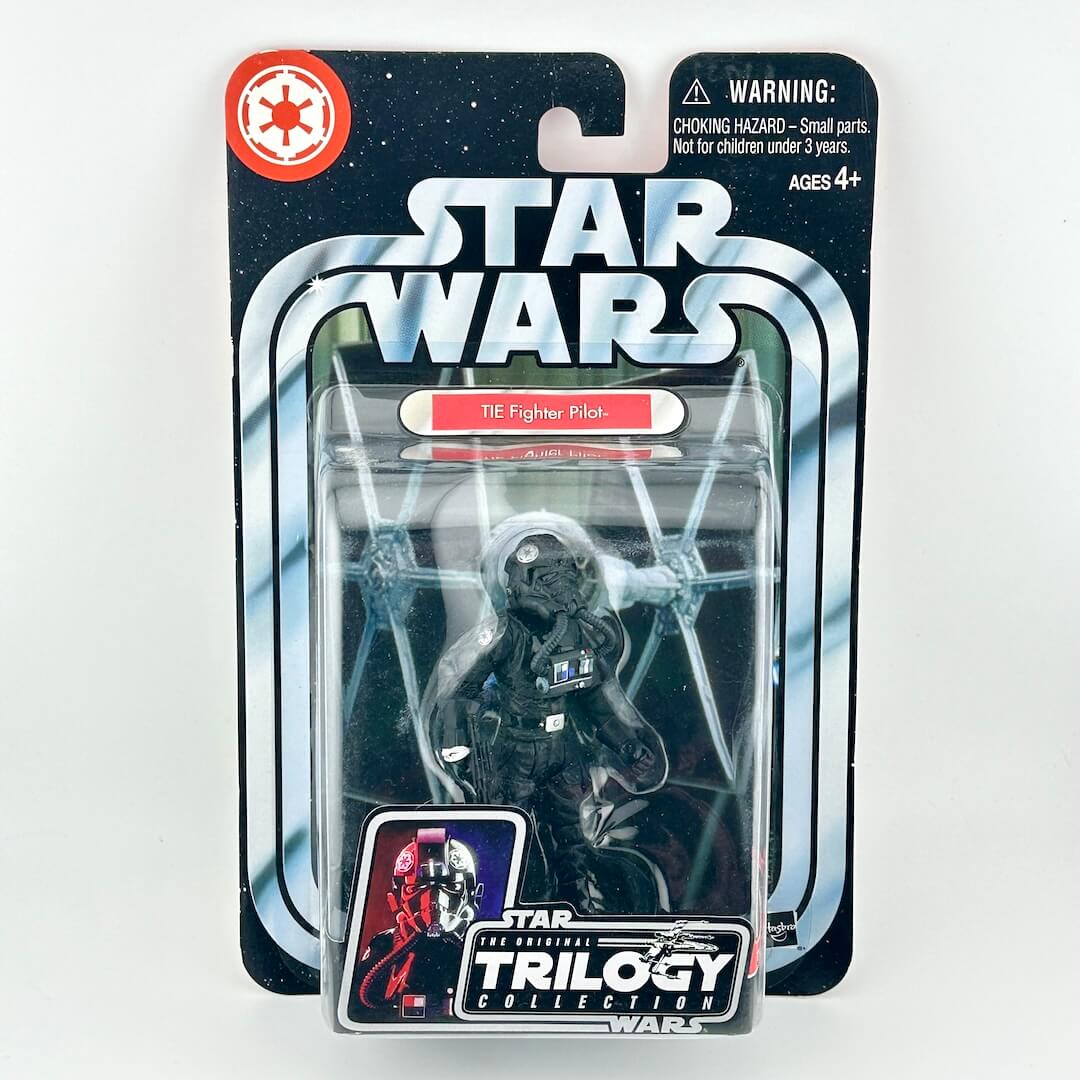 Star Wars The Empire Strikes Back TIE Fighter Pilot action figure in its original retro-style carded packaging.