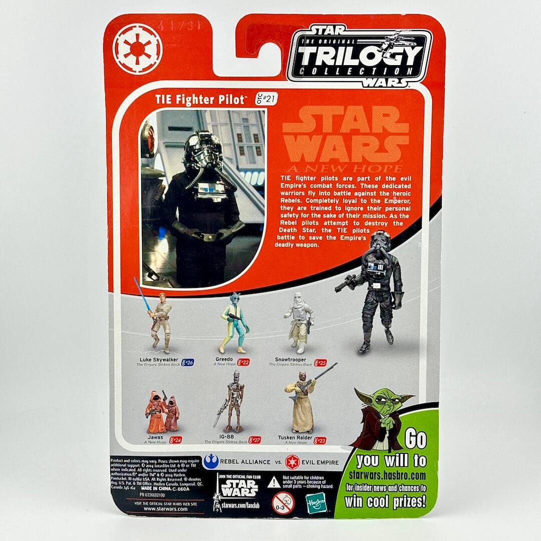 Back of action figure packaging with images of other available figures and product information. 