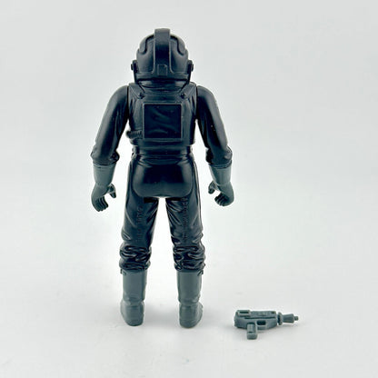 Black action figure with helmet and weapon on a white background