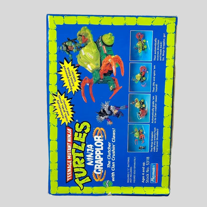 Vintage Teenage Mutant Ninja Turtles toy box with character illustrations on a white background