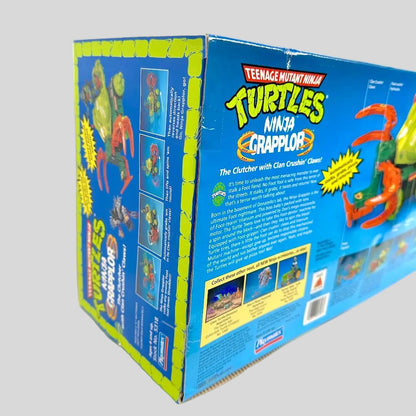 Box of Teenage Mutant Ninja Turtles Grappler toy on a white background