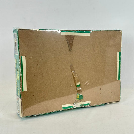 Cardboard box with tape on a gray background