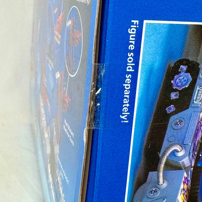 Blue toy packaging with a figure sold separately label