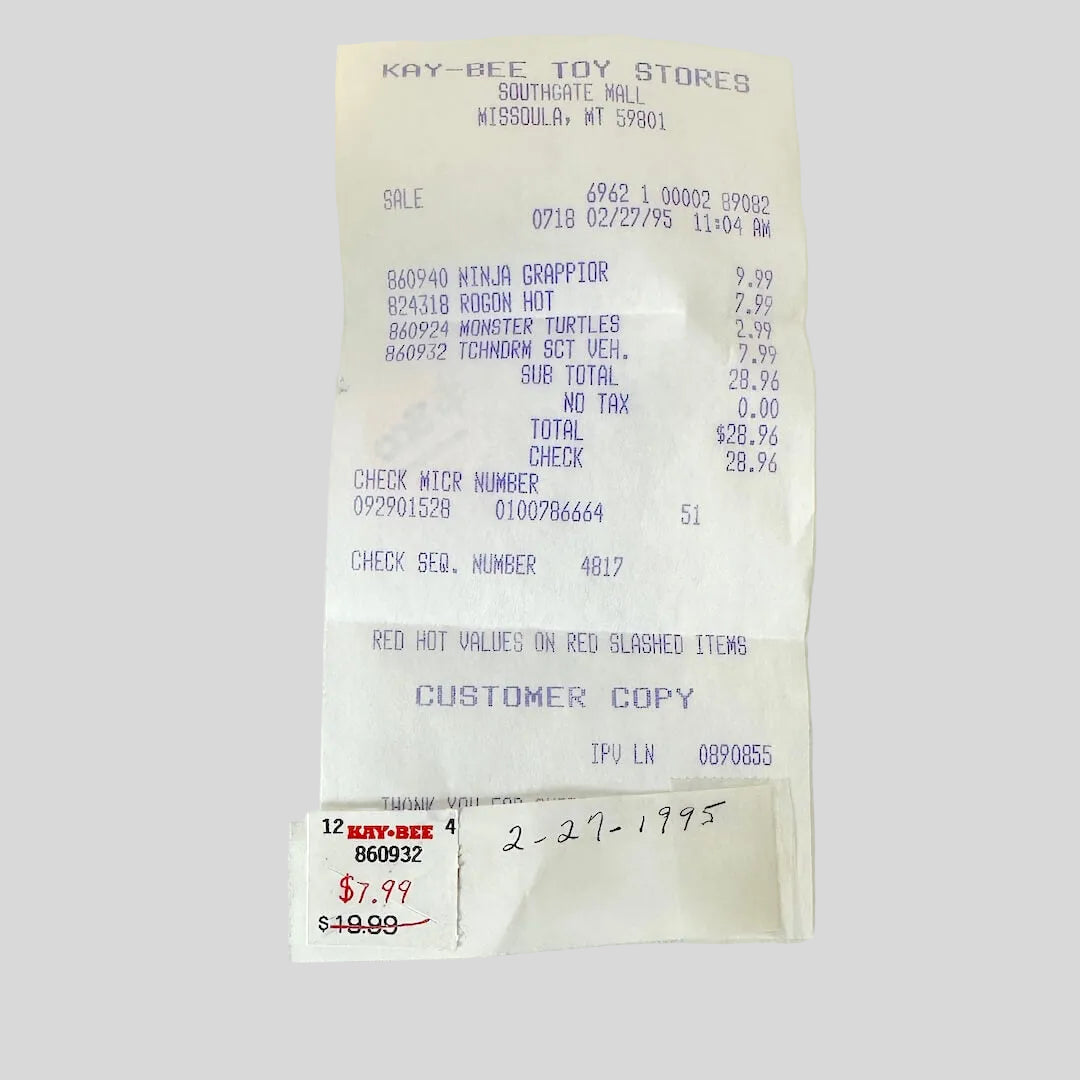 Vintage receipt from Kay-Bee Toy Stores on a white background