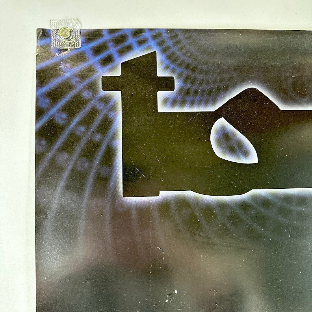 Top left corner of poster showing pin holes and some scratches to poster.