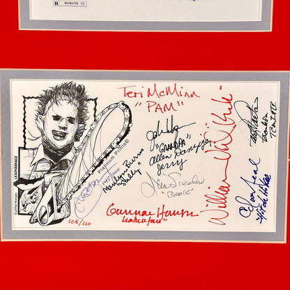 Autographed card with a drawing of a character and multiple signatures on a red background