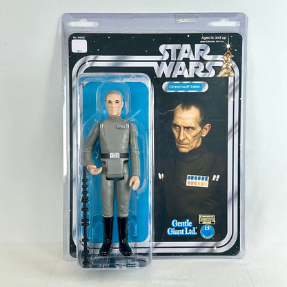 Jumbo Star Wars action figure of Grand Moff Tarkin in gray uniform in original blister packaging. 