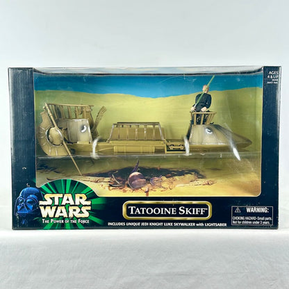 Star Wars playset in original window retail packaging showing skiff and Luke Skywalker action figure inside. 