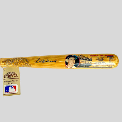 Baseball bat with a player's signature and image on a white background
