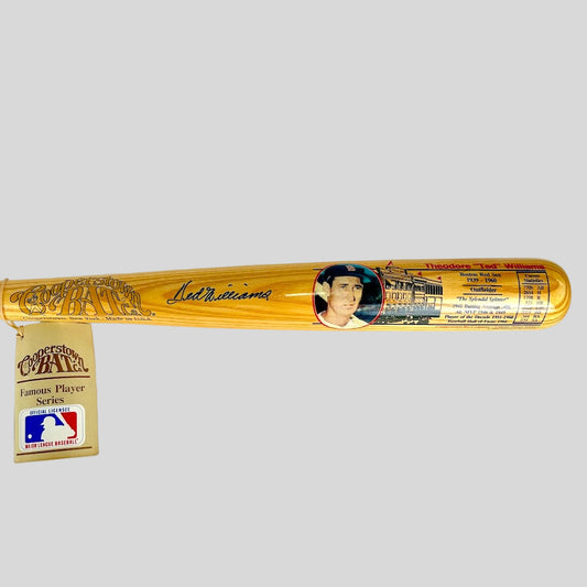 Baseball bat with a player's signature and image on a white background