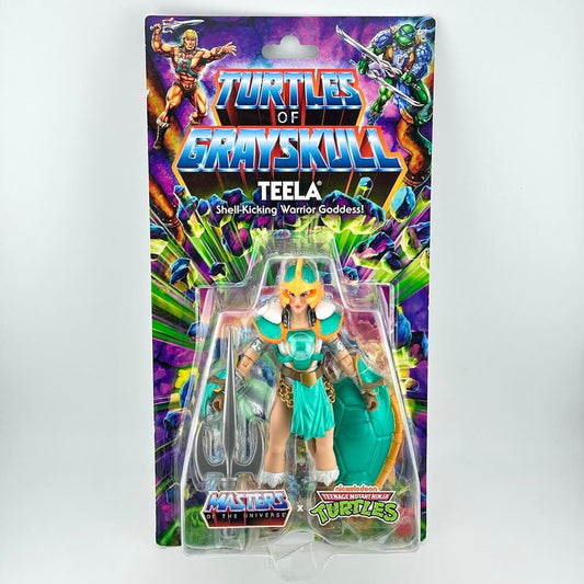 Masters of the Universe x TMNT action figure of Teela from Grayskull, in its original blister card packaging.