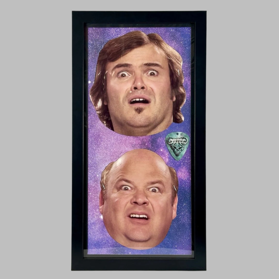 Black frame with purple/blue galaxy background for two masks of band's faces next to green guitar pick. 