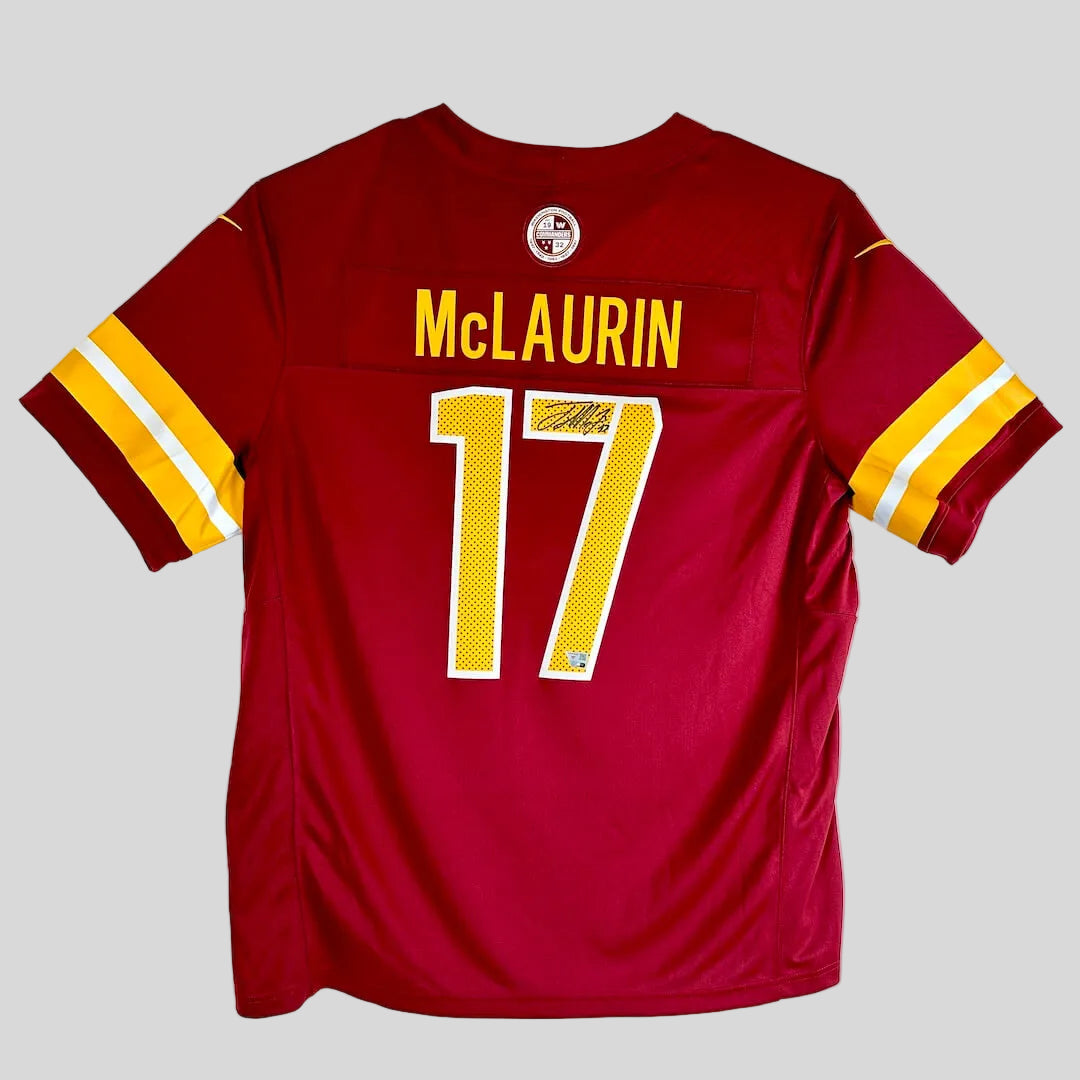 A red football jersey with 'McLAURIN' and the number '17' printed in yellow on the back, yellow and white striped sleeves.