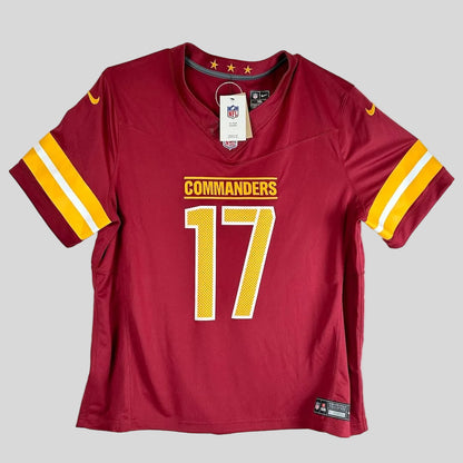 A Washington Redskins home football jersey in maroon with yellow and white sleeve stripes.