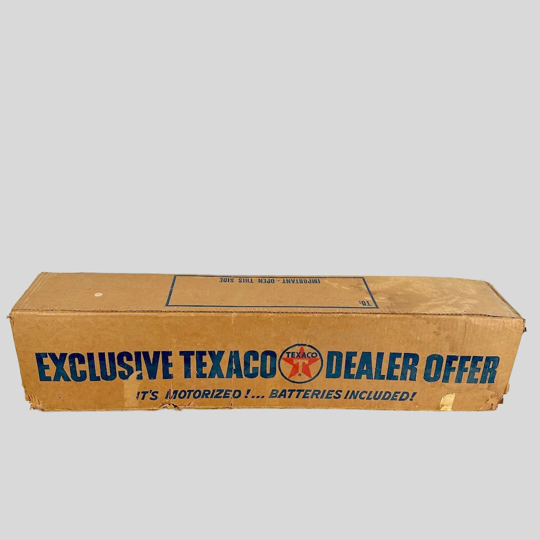 Cardboard box with Texaco branding on a white background