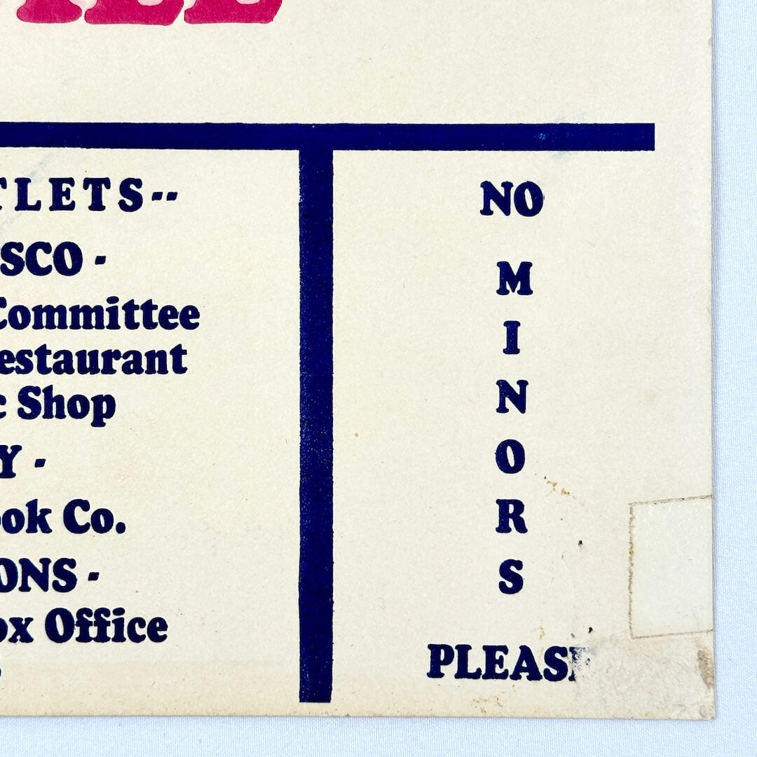 Bottom right corner of poster with tape marks. 