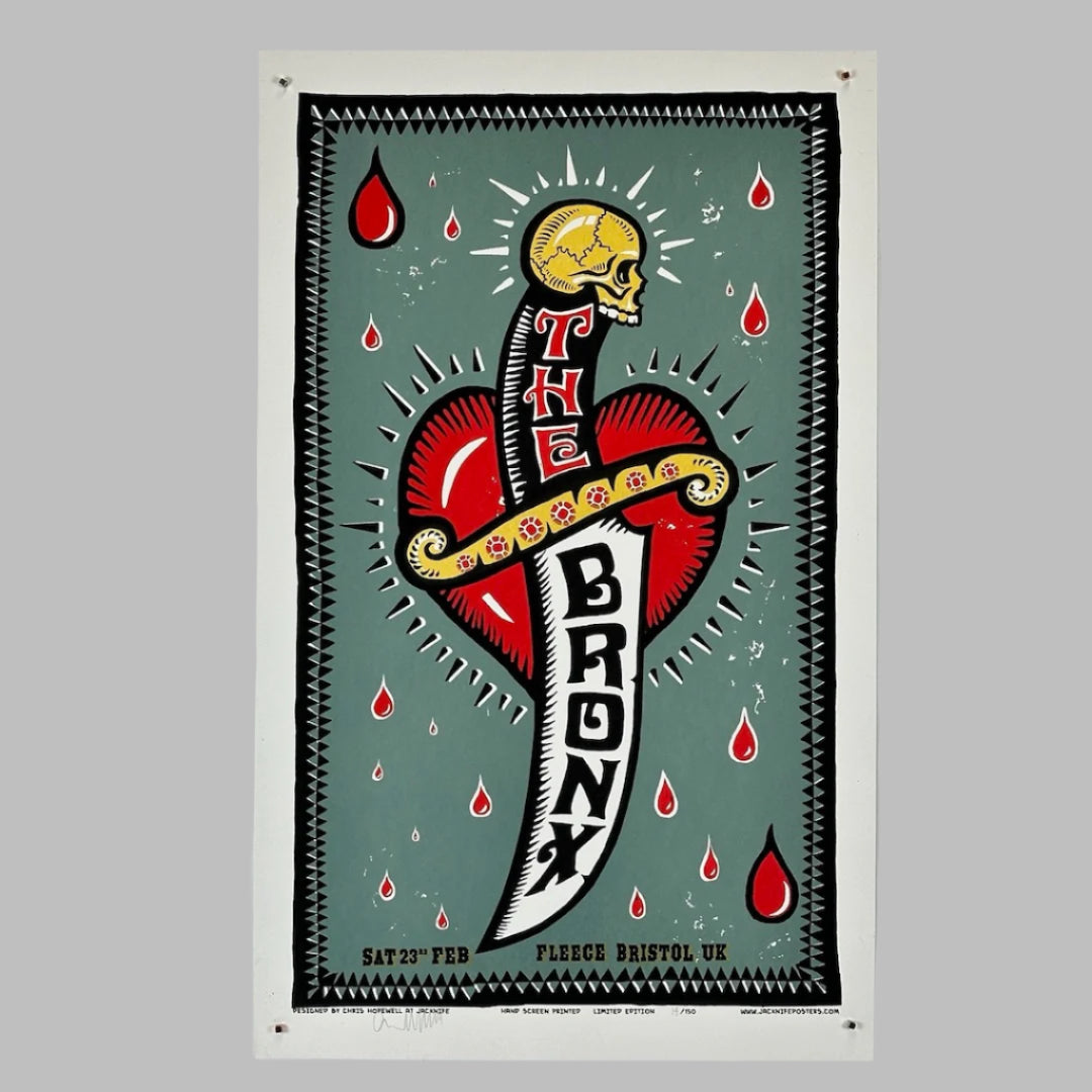 Sage green background with dagger and heart. The BRONX is spelled on the knife blade. Drops of blood around it.  