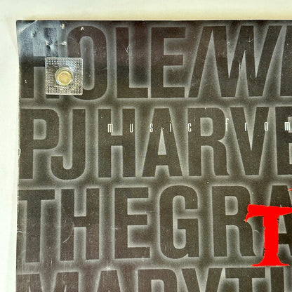 Top left corner with pin holes and some creasing 