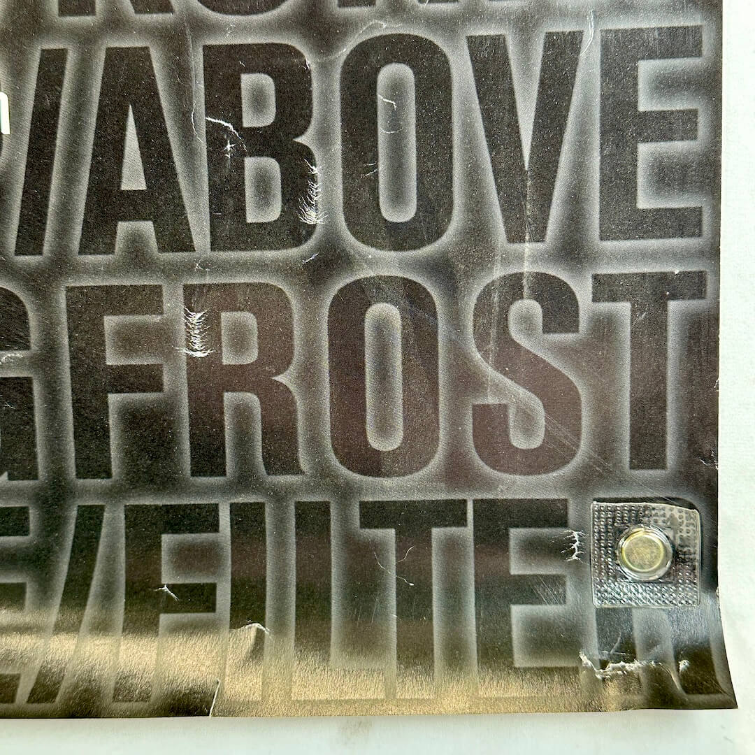 Bottom right corner with scratches, pin holes, and some creasing. 