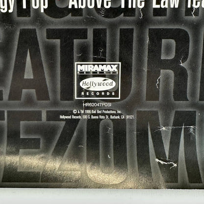 Bottom center of poster showing copyright info and more damage to poster.