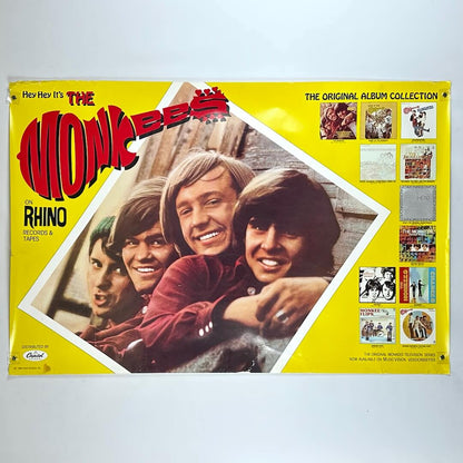 Album cover for 'The Monkees' on Rhino Records with a yellow border and band members' faces.