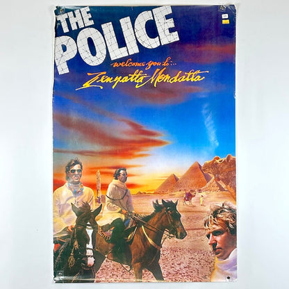 Album cover for 'Zenyatta Mondatta' by The Police with desert scene and people on horses.