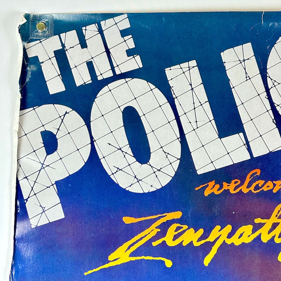 Top left corner with extreme edge wear and slight tear in center of short edge. 