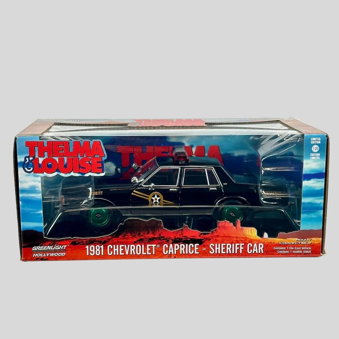 A boxed die-cast model car of a 1981 Chevrolet Caprice as a sheriff car from the movie 'Thelma & Louise'. 