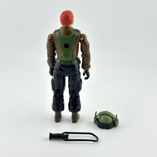 A toy action figure shown from the back on a light gray studio background.