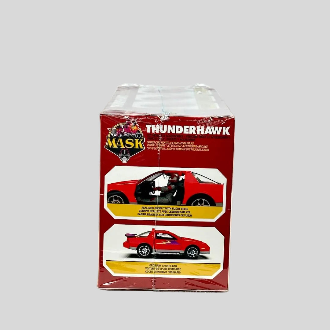 Packaged toy car model of Thunderhawk with MASK logo on a white background
