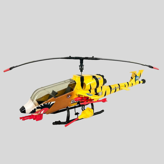 Toy helicopter with tiger stripe design on a white background
