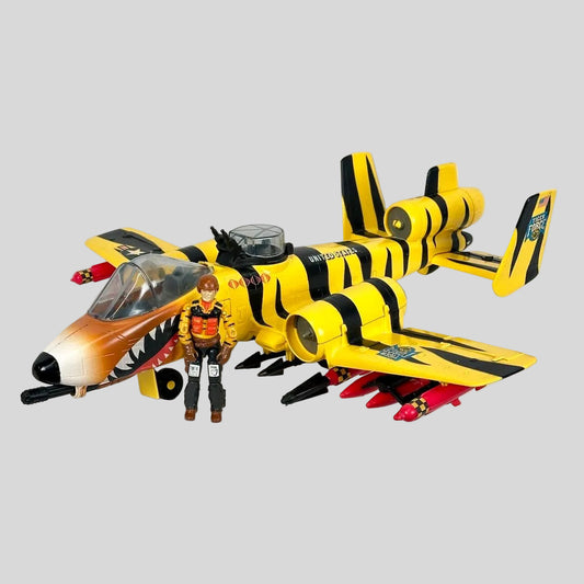 Toy airplane with a figure on a white background